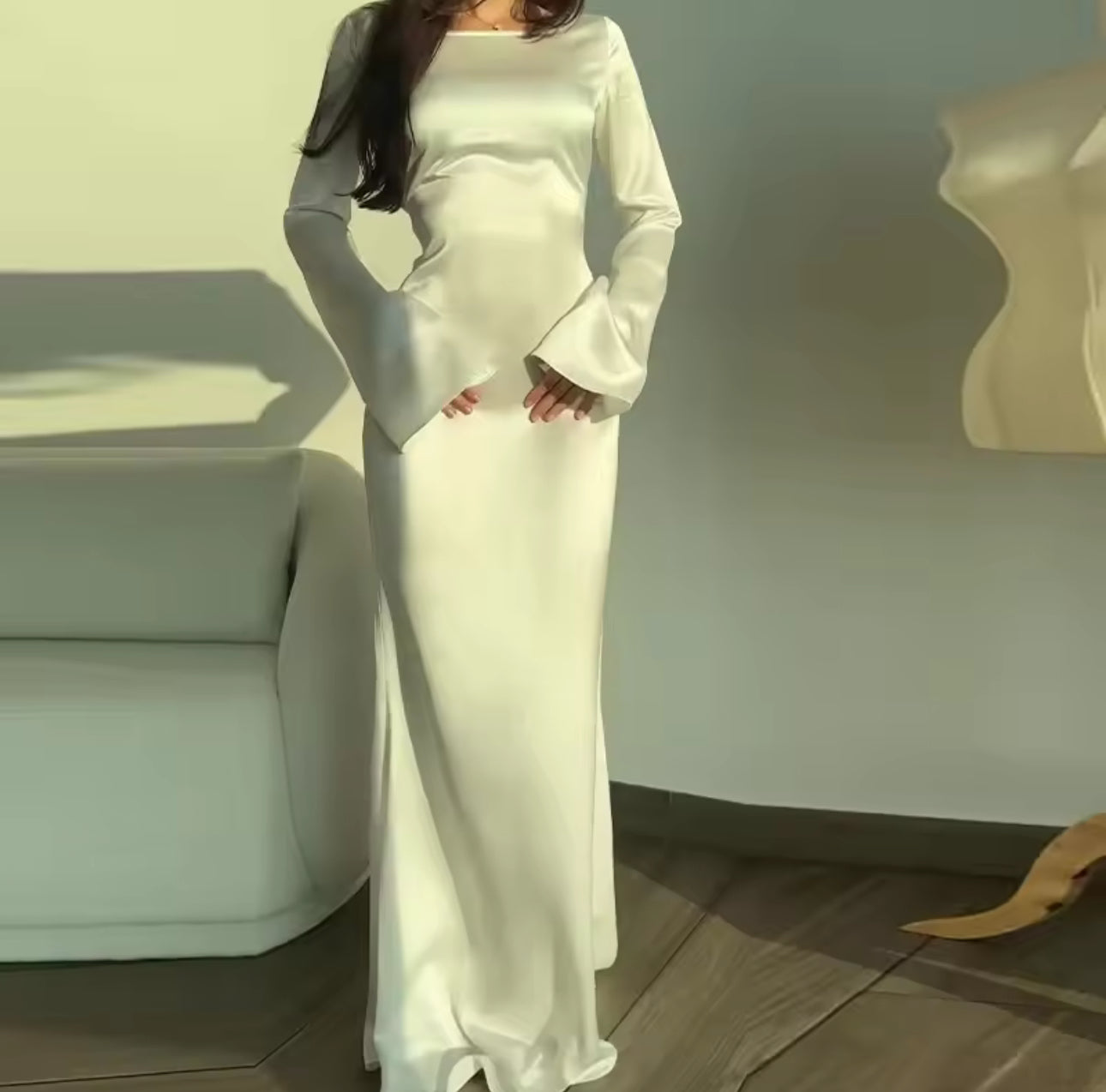 White satin dress with bell sleeves and ruched sides