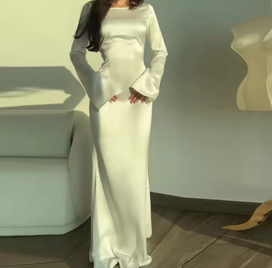 White satin dress with bell sleeves and ruched sides